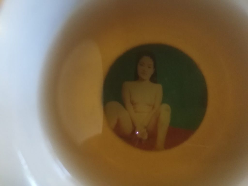 Geisha girl lithophane in tea cup